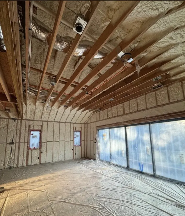 Interior walls and ceiling insulated with spray foam during new construction in LaSalle
